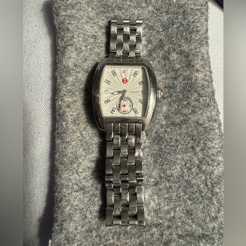 Michele tank stainless watch with diamond chips as numbers.